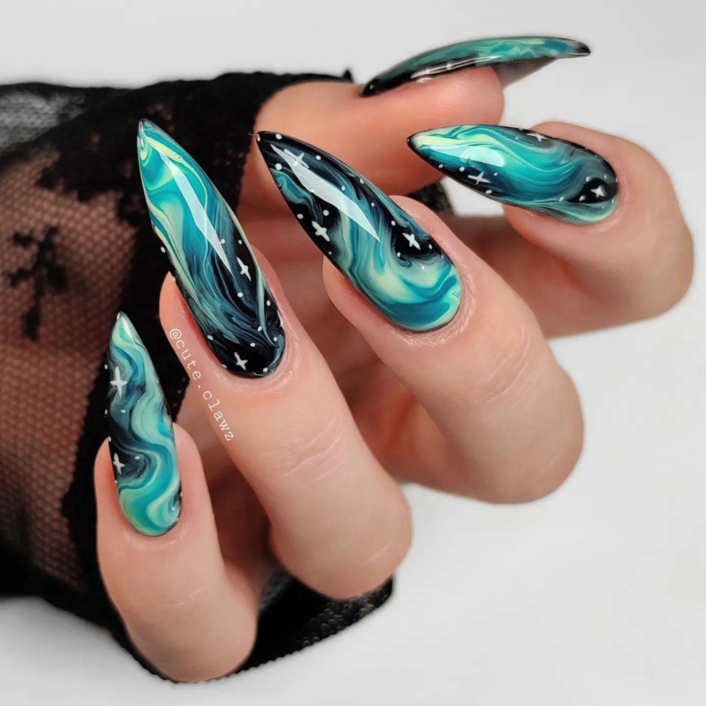 Black Nails With Mesmerizing Galaxy Designs
