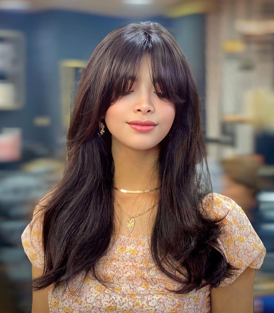 Butterfly Haircut With Wispy Bangs