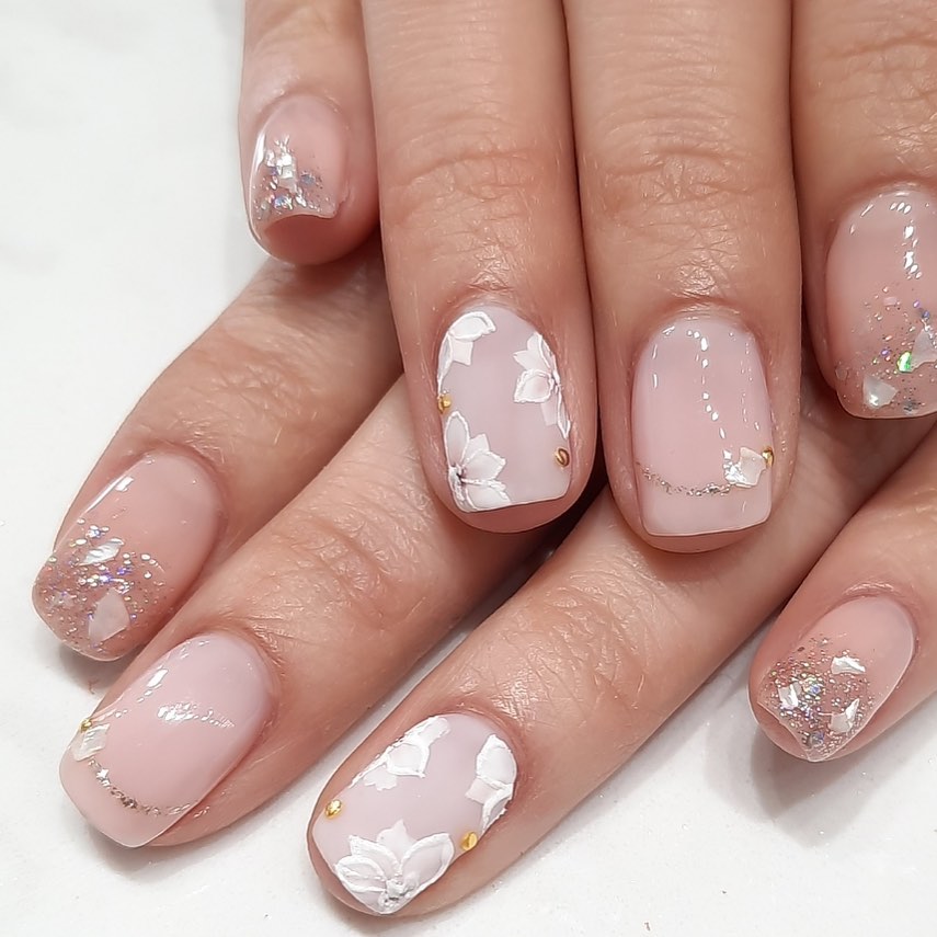 Nude Pink Nails with Floral Details