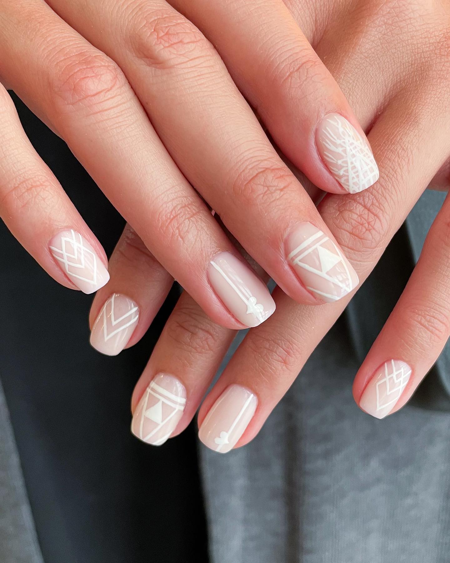 Nude Pink Nails with Geometric Patterns