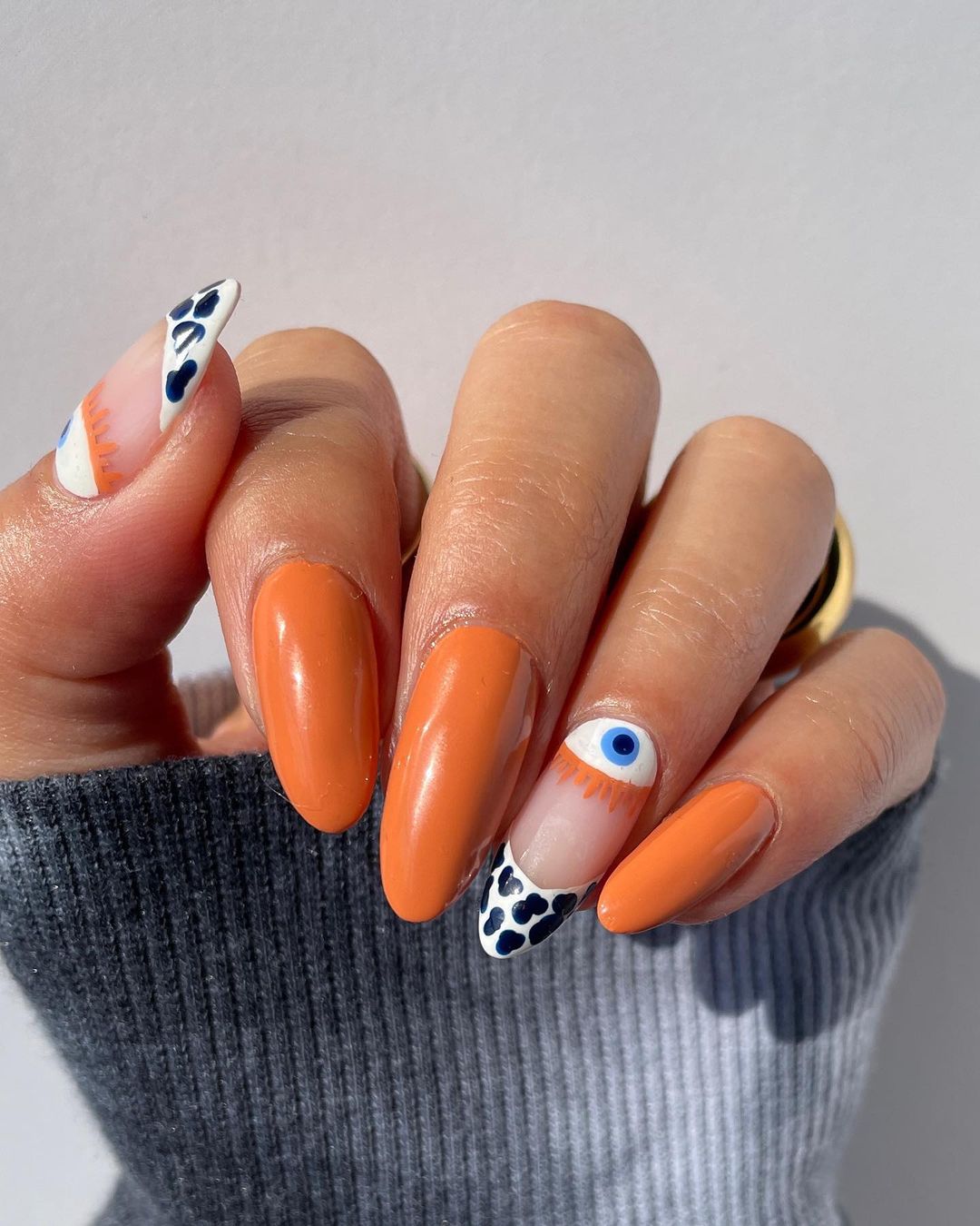 Orange Evil Eye Nails