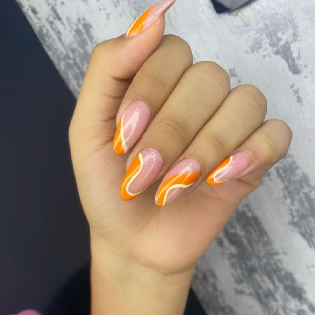 Orange Nails with Waves Pattern