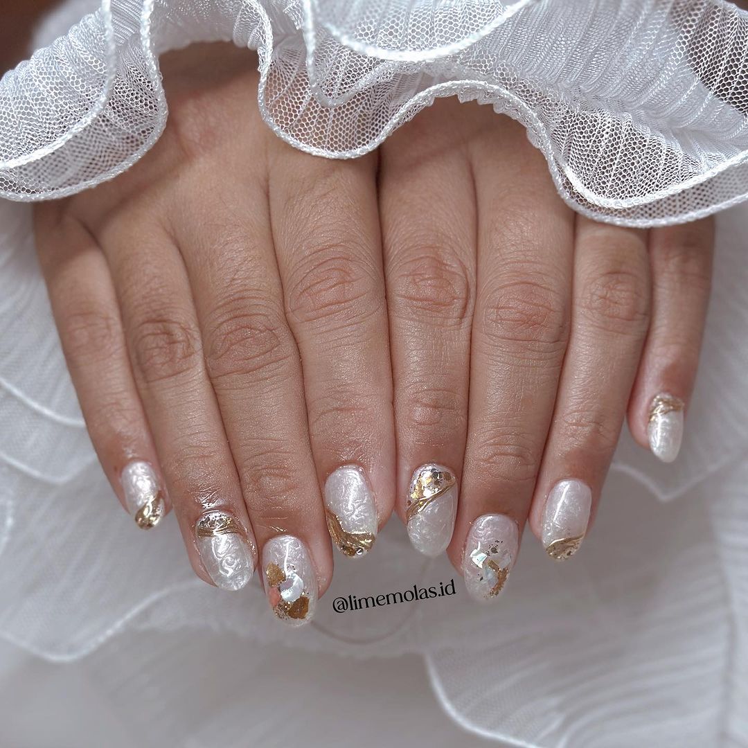 Pearl And Gold Nails