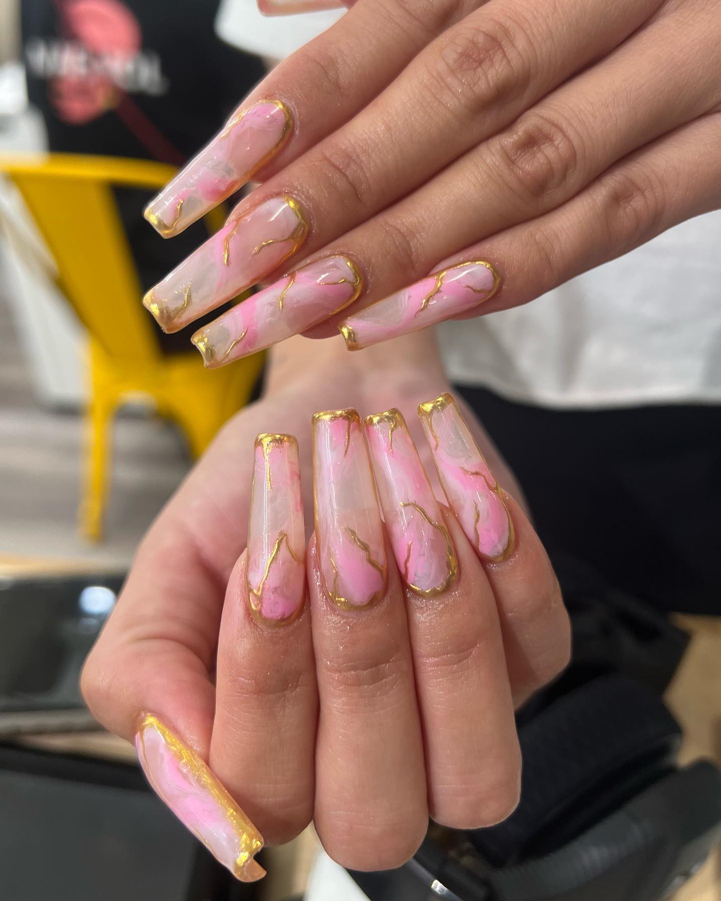 Pink Marble Nails With Gold Accents