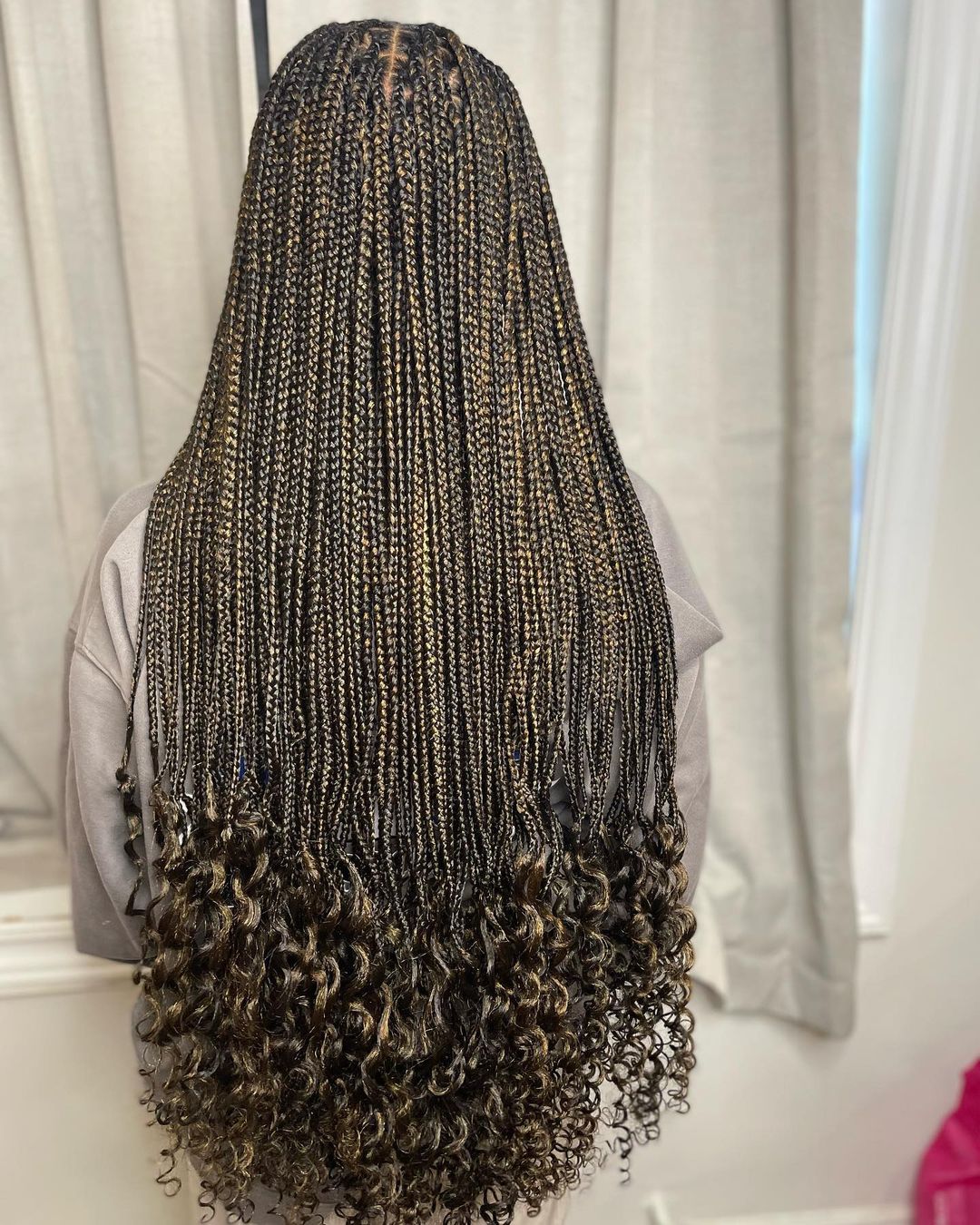Small Knotless Braids with Curls