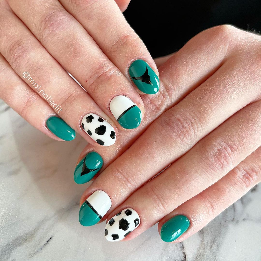 Turquoise And Cow Print Nails
